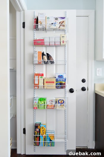 Pantry door organizer with snacks, pasta, and coffee items