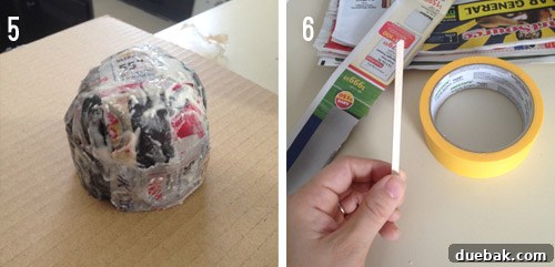 Paper mache narwhal head base being formed with newspaper strips