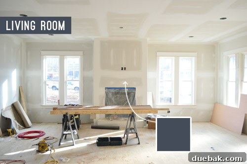 Living room in the showhouse with fireplace column and open concept layout