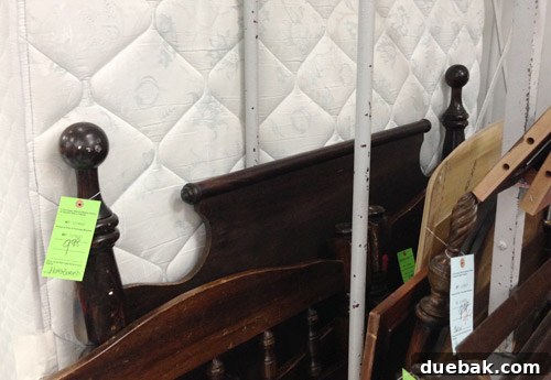 Vintage wooden headboard found for the girl's bedroom in the showhouse