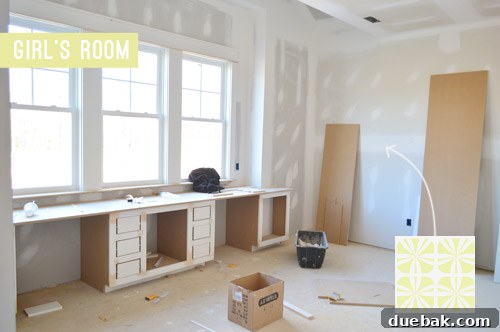 Girl's bedroom showing a built-in desk and future accent wall