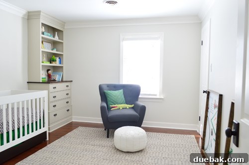 Empty nursery room window before curtains, showcasing a blank canvas.
