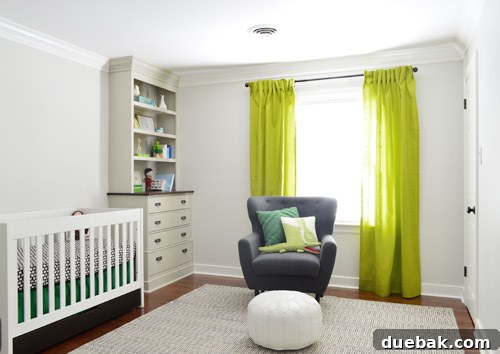 Nursery room after curtains are installed, featuring bright apple green pinch pleat drapes.