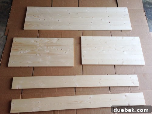 Finished wood panels after joining and sanding, ready for staining.