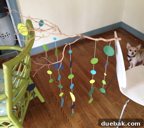 Craft Your Own Adorable Nursery Mobile 11 Our dog Burger supervising the mobile assembly process