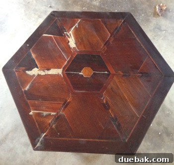 Applying stain to the refinished table top