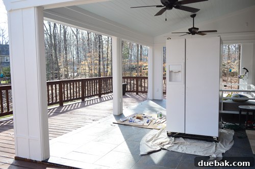 refrigerator drying on back porch after painting