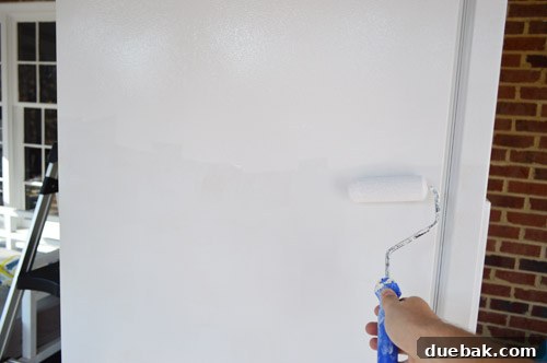 second coat of appliance epoxy on refrigerator