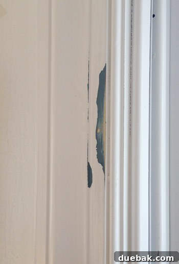 Close-up of paint drips on trim