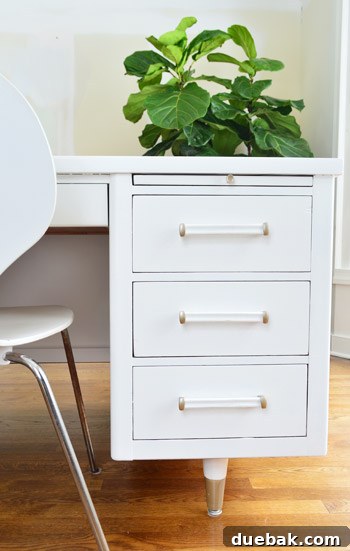 A closer view of the desk, highlighting the champagne mist painted legs.