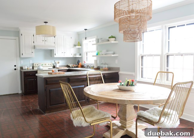 Listy VonListerstein: The Art of Intentional Listing 11 Kitchen space with painted cabinets, updated lighting, and new table in the eat-in area.