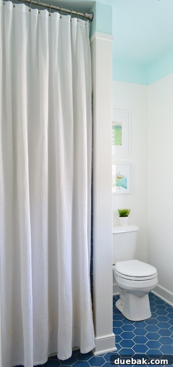 Listy VonListerstein: The Art of Intentional Listing 15 Primary bathroom with wallpaper removed, painted walls, and privacy blinds.