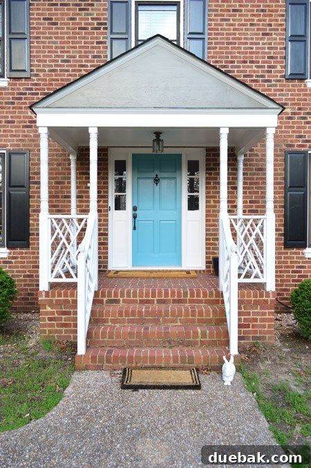 Listy VonListerstein: The Art of Intentional Listing 3 Close-up of a home's portico with a new coat of paint and some decorative elements.