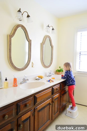 Listy VonListerstein: The Art of Intentional Listing 21 Hall bathroom with painted door and trim, ready for faucet, mirror, and light upgrades.