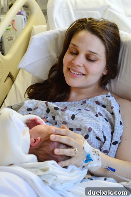 He Makes His Entrance 5 Proud parents looking lovingly at their newborn baby Teddy, capturing a tender moment of affection and adoration for their new son.