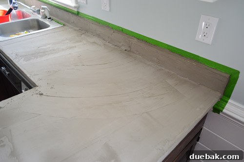 First coat of Ardex dried, with taped walls