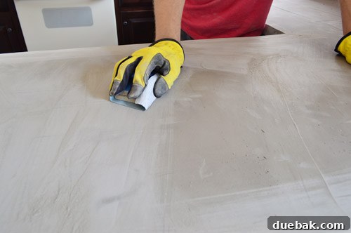 Hand sanding Ardex Feather Finish on kitchen counters