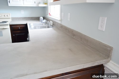 Applying Ardex to the kitchen backsplash