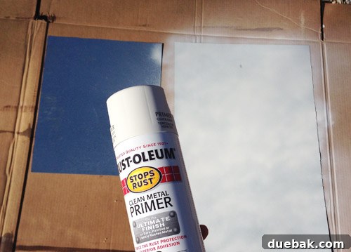 Build Your Own Magnetic Display Board 12 Applying primer to the sheet metal panels to ensure paint adhesion and a smooth finish