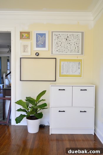 Build Your Own Magnetic Display Board 5 Initial planning phase showing various frames arranged on the wall to visualize the layout