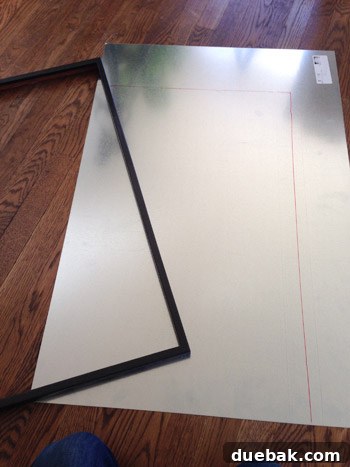 Build Your Own Magnetic Display Board 8 Carefully tracing the inner dimensions of the frame onto the sheet metal for precise cutting