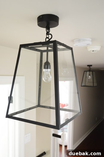 Newly installed modern pendant lights in the hallway