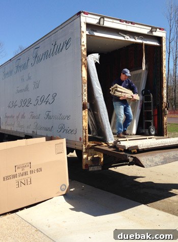 Showhouse Styling 2 King-sized mattress being moved into the main bedroom of the Homearama showhouse
