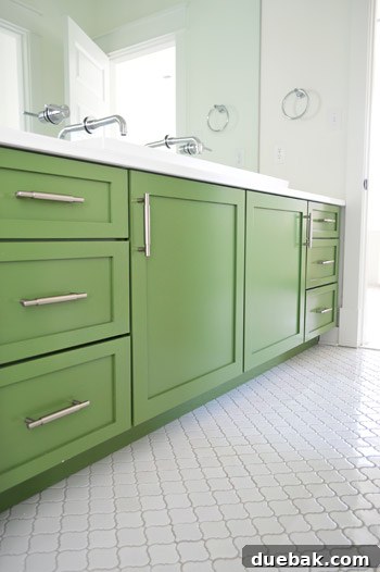 Showhouse Styling 18 Another view of the green vanity and wall-mounted faucets in the kids' bathroom