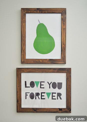 A Burst of Green Joy for the Nursery Closet 11 DIY pear artwork in a wooden frame hanging in the nursery