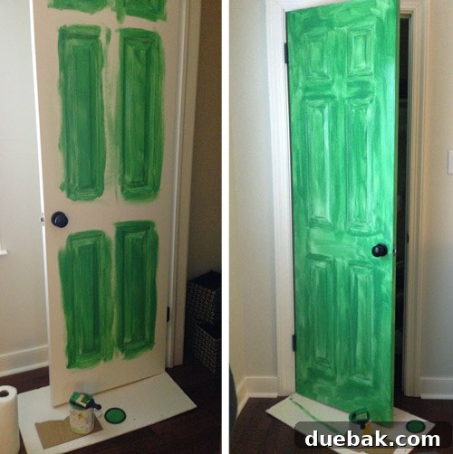 A Burst of Green Joy for the Nursery Closet 8 First coat of green paint being applied to the nursery closet door with a brush