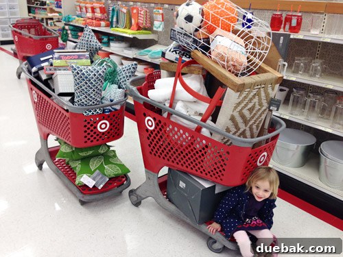 Crafting the Dream Showhouse 5 Multiple shopping carts filled with home decor items from a large retailer.