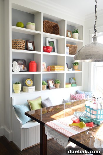 Crafting the Dream Showhouse 7 A breakfast nook with built-in shelves and a table, showcasing recent progress.