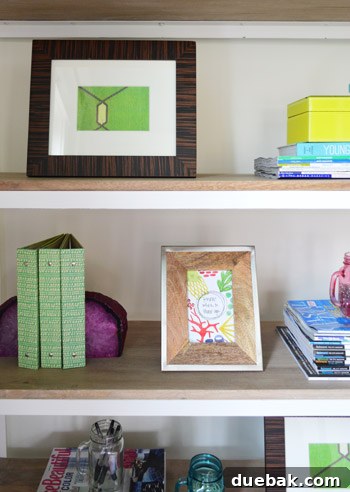 Close-up of styled office shelves with books and magazines