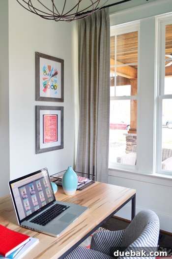 Framed motivational artwork in a home office