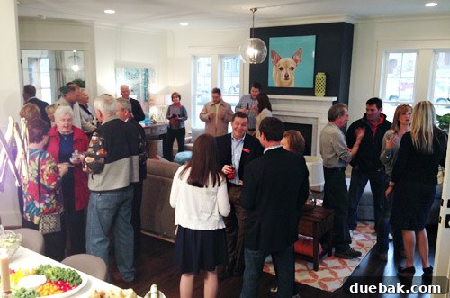 Guests mingling in the elegant Homearama Showhouse