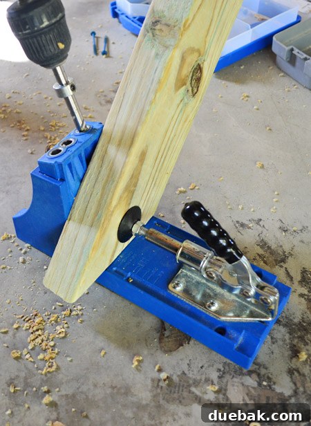Using Kreg Jig To Create Pocket Holes In Pressure Treated Wood For Deck Gate Assembly