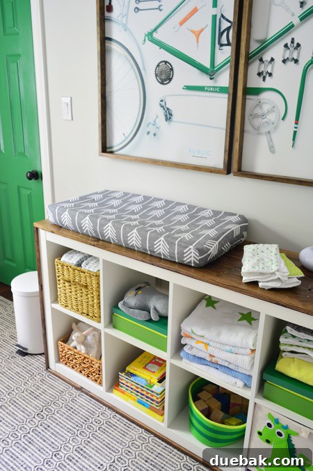 Baby Teddy on arrow print changing pad