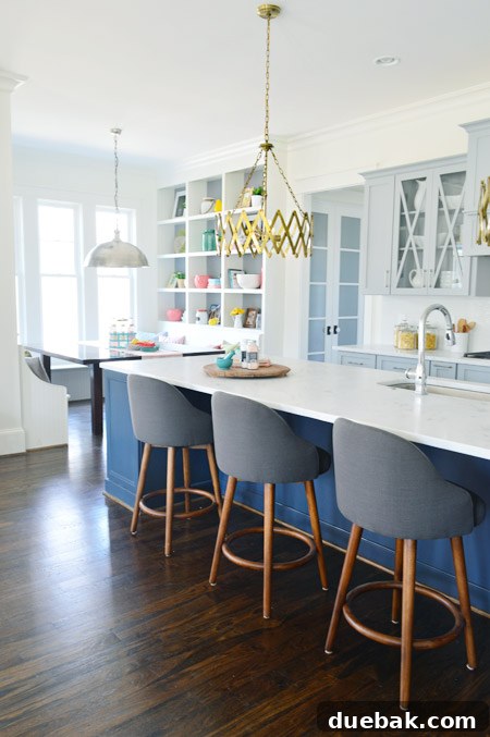 Breakfast Nook with Built-in Banquette and Frosted Pantry Doors