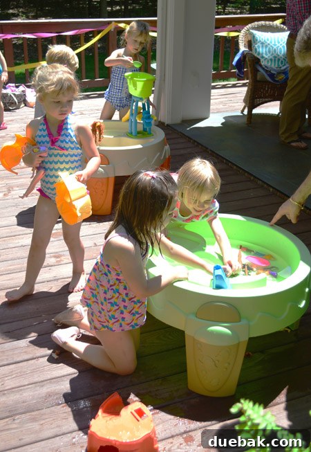 The Ultimate Pink and Gold Kids Celebration 17 Water tables at party