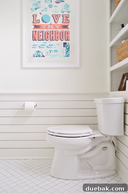 The Family Act 14 Close-up of slatted wainscoting and patterned tile floor in a bathroom