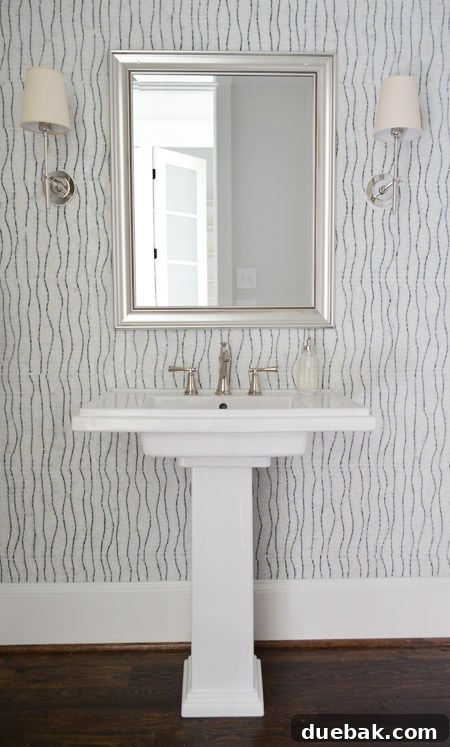 Our Showhouse: Full Video Walkthrough 11 Powder room with floor-to-ceiling wave pattern tile accent wall