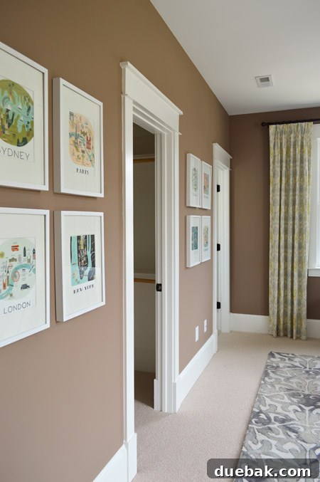 Our Showhouse: Full Video Walkthrough 19 Close-up of guest bedroom nightstand with lamp, book, and artwork