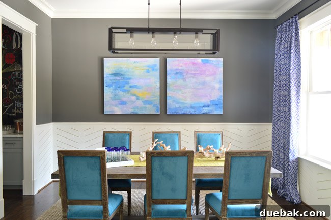 Our Showhouse: Full Video Walkthrough 4 Close-up of dining room with peacock chairs, trestle table, and vibrant artwork
