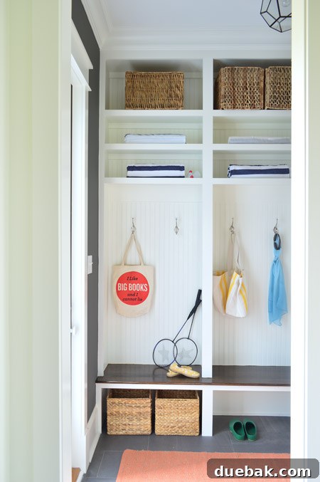 Our Showhouse: Full Video Walkthrough 9 Mudroom built-ins with baskets and accessories, showing glass door