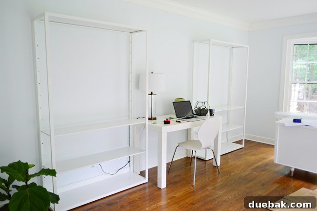 Elevating Our Home Office with Fjalkinge Bookshelves 10 Partially assembled IKEA Fjälkinge frames in office