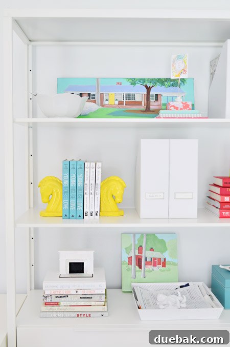 Multitasking decor: vase holding wires, zebra dish for magnets, horse head bookends