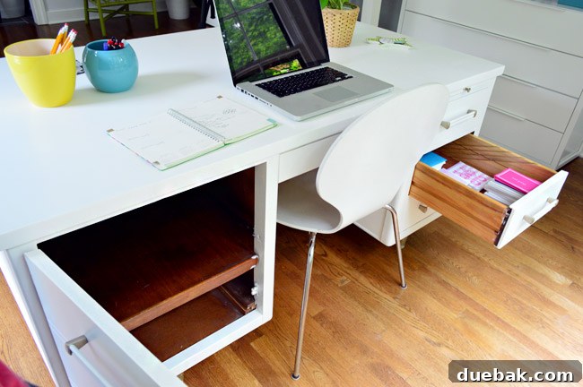Drawers of the floating desk, some kept empty for future storage
