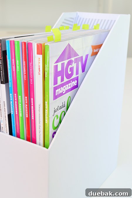Close-up of magazine storage boxes organized by year on shelves