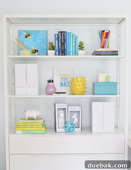 Books and decorative boxes on shelves, hiding office supplies