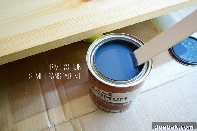 Thrifted Coffee Table's Bold Blue Stain Makeover 12 Testing different stain coats on a scrap wood piece, including blue and dark walnut